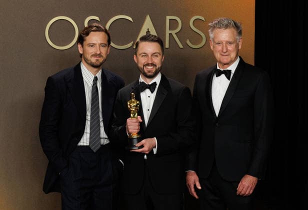 March 15, 2026, Hollywood, California, USA: Andy Jurgensen, winner of the Best Film Editing Award for Ã¢â‚¬oeOne Battle After AnotherÃ¢â‚¬Â, poses with Lewis Pullman and Bill Pullman in the press room of the 98th Annual Academy Awards on Sunday March 15, 2026 at the Dolby Theater in Hollywood, California. PRENSA INTERNACIONAL Hollywood USA  - ZUMAp124 20260315_zaa_p124_388 Copyright: xPrensaxInternacionalx