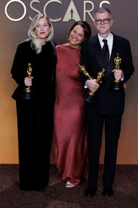 March 15, 2026, Hollywood, California, USA: (L-R) Sara Murphy, Carmen Ruiz de Huidobro and Paul Thomas Anderson in the press room of the 98th Annual Academy Awards on Sunday March 15, 2026 at the Dolby Theater in Hollywood, California. BURT HARRIS BNS PI Hollywood USA - ZUMAp124 20260315_zaa_p124_410 Copyright: xBurtxHarrisx