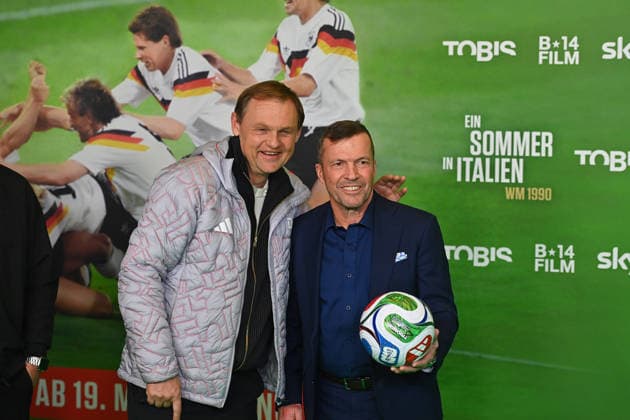Bjoern GULDEN Adidas CEO with Lothar MATTHAEUS Premiere EIN SOMMER IN ITALIEN WM 1990 am 16 03 20226 im Mathaeser Kino in Muenchen Roter Teppich,Red Carpet