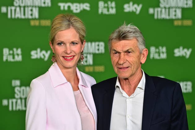 Klaus AUGENTHALER with wife Sandra Premiere EIN SOMMER IN ITALIEN WM 1990 on 16 03 20226 at Mathaeser Kino in Munich Red Carpet,Red Carpet