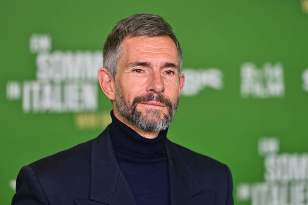 Micky BEISENHERZ, single picture,cropped single motif,portrait,portrait premiere EIN SOMMER IN ITALIEN WM 1990 am 16 03 20226 im Mathaeser Kino in Muenchen Roter Teppich,Red Carpet