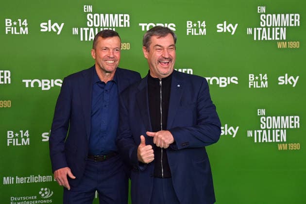 from left Lothar MATTHAEUS, Markus SOEDER State Premier of Bavaria and CSU Chairman Premiere EIN SOMMER IN ITALIEN WM 1990 on 16 03 20226 at Mathaeser Kino in Munich Red Carpet,Red Carpet