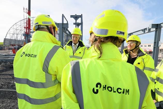 King Philippe - Filip of Belgium pictured during a royal visit to the Holcim cement plant in Obourg, on Tuesday 17 March 2026. The plant will explain on their GO4ZERO project, which aims to deliver a carbon-neutral production facility by 2030-2031. A new factory will be built here that can produce 2 million tonnes of low-carbon cement annually.  BENOITxDOPPAGNE 167854887