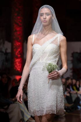 Telier Couture Fashion Week Madrid in Spain - 17 Mar 2026 A model walks the runway wearing a design by atelier couture during Fashion Week de Madrid in Fabric de Tapices. Madrid Spain Copyright: xAtilanoxGarciax xSOPAxImagesx photos08905