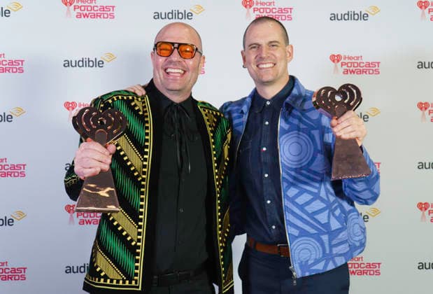 March 16, 2026: Austin, Texas. 2026 IHeartPodcast Awards, winners pose with their awards. Ben Mandelker & Ronnie Karam - Watch What Crappens Best TV & Film.  - ZUMAda1_ 20260316_zap_da1_064 Copyright: xSandraxDahdahx