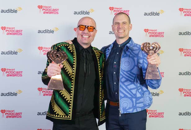 March 16, 2026: Austin, Texas. 2026 IHeartPodcast Awards, winners pose with their awards. Ben Mandelker & Ronnie Karam - Watch What Crappens Best TV & Film.  - ZUMAda1_ 20260316_zap_da1_065 Copyright: xSandraxDahdahx