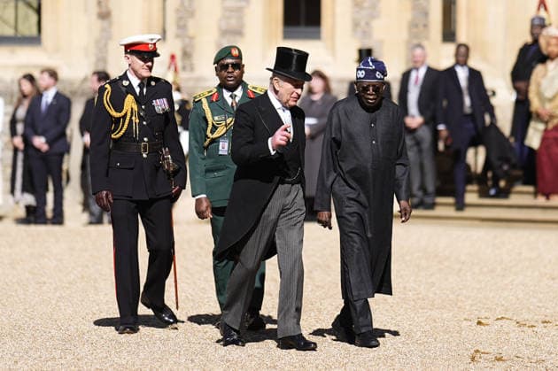 President of Nigeria s state visit to the UK, 17 March 2026 King Charles III and President of Nigeria Bola Ahmed Tinubu during the ceremonial welcome at Windsor Castle, Berkshire, on day one of his state visit to the UK. Picture date: Wednesday March 18, 2026., Credit:Aaron Chown Avalon UK, Windsor  Copyright: xAaronxChownx xAvalonx 1084068301