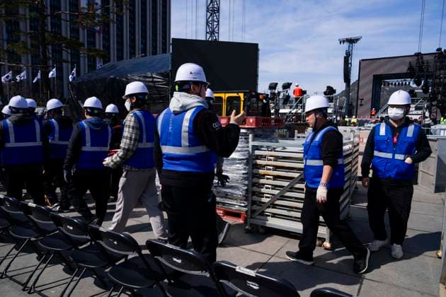 March 19, 2026, Seoul, South Korea: Workers walk by at the venue for the comeback concert of the K-pop boy band BTS in Gwanghwamun Square on Thursday, March 19, 2026 in Seoul, South Korea. All seven members of BTS, which has been on hiatus since 2022 due to compulsory military service, are returning in a free concert on March 21, 2026 for their upcoming new album ARIRANG. Seoul South Korea - ZUMAh163 20260319_znp_h163_014 Copyright: xJintakxHanx