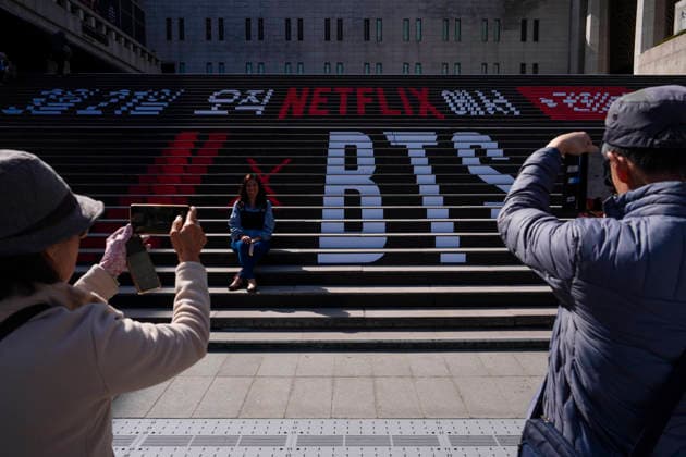 March 19, 2026, Seoul, South Korea: Tourists take pictures at a staircase near the venue for the comeback concert of the K-pop boy band BTS in Gwanghwamun Square on Thursday, March 19, 2026 in Seoul, South Korea. All seven members of BTS, which has been on hiatus since 2022 due to compulsory military service, are returning in a free concert on March 21, 2026 for their upcoming new album ARIRANG. Seoul South Korea - ZUMAh163 20260319_znp_h163_025 Copyright: xJintakxHanx