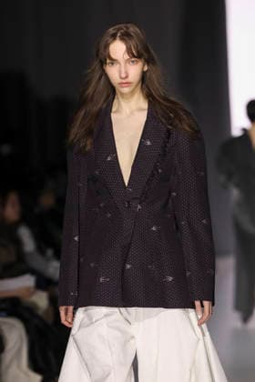 March 19, 2026, Tokyo, Japan: A model wearing fashion brand YOHEI OHNO walks down the runway during the Rakuten Fashion Week TOKYO 2026 Autumn Winter Collection. The fashion week runs from March 16 to 21. Tokyo Japan  - ZUMAm191 20260319_aap_m191_045 Copyright: xRodrigoxReyesxMarinx