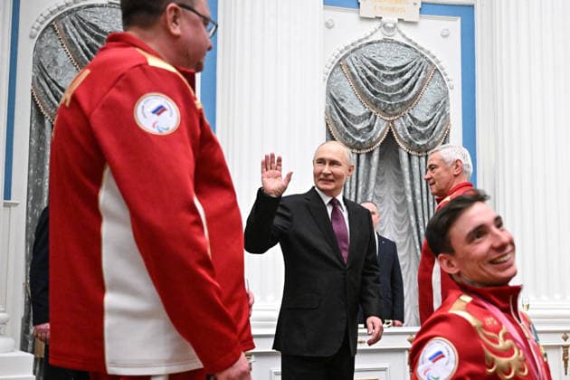 Russia Putin Paralympic Athletes 9126998 19.03.2026 Russian President Vladimir Putin meets with participants after a state awards ceremony for the Russian medalists of the Milano Cortina 2026 Paralympic Winter Games at the Kremlin in Moscow, Russia. Sergey Bobylev Sputnik Moscow Russia  Copyright: xSergeyxBobylevx