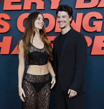 Cast members Camila Morrone (L) and Adam DiMarco attend the premiere of Netflix s supernatural horror TV mini series Something Very Bad Is Going to Happen at the Egyptian Theatre in the Hollywood section of Los Angeles on Thursday, March 19, 2026. Storyline: A bride has a feeling that something horrifying will happen at her wedding Ñ and the closer to the altar she gets, the worse it becomes.  LAP2026031929 JIMxRUYMEN