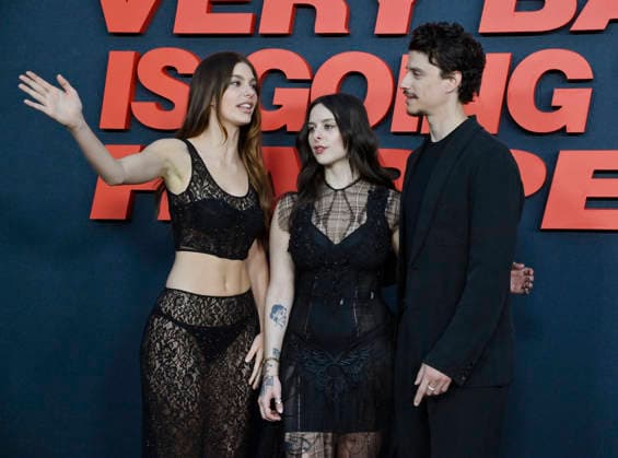 Cast members Camila Morrone, Haley Z. Boston and Adam DiMarco attend the premiere of Netflix s supernatural horror TV mini series Something Very Bad Is Going to Happen at the Egyptian Theatre in the Hollywood section of Los Angeles on Thursday, March 19, 2026. Storyline: A bride has a feeling that something horrifying will happen at her wedding Ñ and the closer to the altar she gets, the worse it becomes.  LAP2026031937 JIMxRUYMEN
