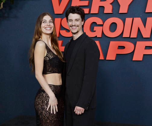 Cast members Camila Morrone (L) and Adam DiMarco attend the premiere of Netflix s supernatural horror TV mini series Something Very Bad Is Going to Happen at the Egyptian Theatre in the Hollywood section of Los Angeles on Thursday, March 19, 2026. Storyline: A bride has a feeling that something horrifying will happen at her wedding Ñ and the closer to the altar she gets, the worse it becomes.  LAP2026031906 JIMxRUYMEN