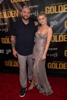 March 19, 2026, Los Angeles, California, USA: NICK LEISURE AND ALENA SAVOSTIKOVA attends the Level 33 Entertainment Ã¢â‚¬oeGOLDENÃ¢â‚¬Â red carpet premiere on March 19, 2026 at the Laemmle Royal Theatre in Los Angeles, California. Los Angeles USA - ZUMAw213 20260319_zep_w213_009 Copyright: xDrewxBlyx