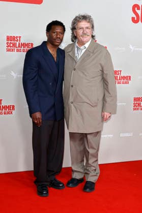 Akeem van Flodrop and Hape Kerkeling at the premiere of the movie Horst Schlämmer sucht das Glück at the Lichtburg Essen, 19 03 2026 Foto:xT.xSchröerx xFuturexImagex schlaemmer_6397