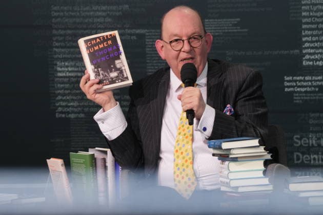 Buchmesse Leipzig GER, Leipzig,20260319, Buchmesse Leipzig, Messehalle , Denis Scheck, Best of druckfrisch, , Presentation of new publications, is a translator and journalist in radio and television , Schattennummer by Thomas Pynchon, Roman
