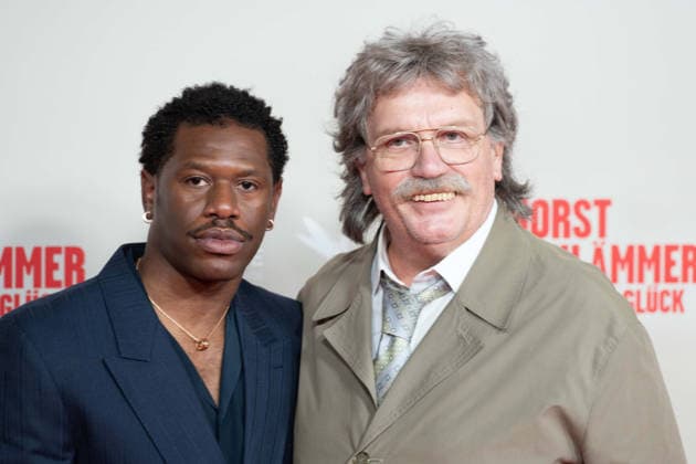 from left Akeem van FLODROP actor, Hape KERKELING in the role of Horst Schlaemmer, Schlämmer, red carpet, red carpet show, arrival, film premiere HORST SCHLAEMMER SUCHT DAS GLUECK, Schlämmer, at the Lichtburg in Essen, 19 03 2026