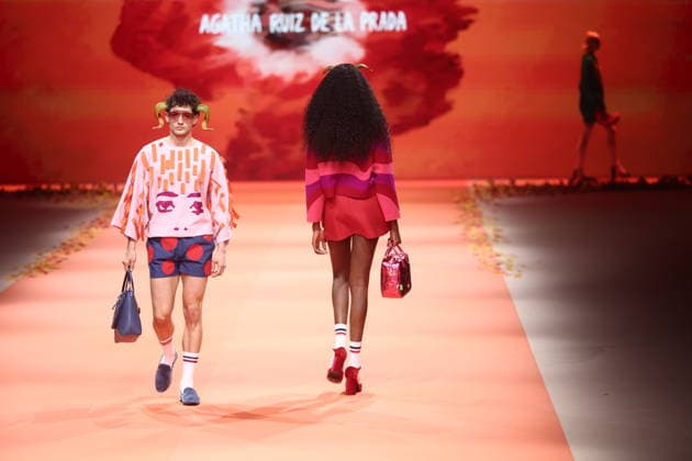 Agatha Ruiz de la Prada fashion show at Mercedes Benz Fashion Week in Madrid A model during an Agatha Ruiz de la Prada fashion show at Mercedes Benz Fashion Week, March 20, 2026, in Madrid Spain The Madrid-based designer Agatha Ruiz de la Prada, a Spanish fashion icon for her pop universe of vibrant colors and geometric shapes, presents her spring summer 2026 collection at MBFWMadrid, Spanish fashion icon for her pop universe of vibrant colors and geometric shapes, presents at MBFWMadrid her spring summer collection 2026, created with the support of artificial intelligence and faithful to her unmistakable hearts and playful volumes at IFEMA Madrid 20 MARCH 2026 Madrid Madrid Madrid Spain  Copyright: xEduardoxParrax 7383003