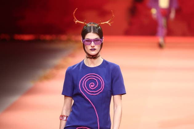 Agatha Ruiz de la Prada fashion show at Mercedes Benz Fashion Week in Madrid A model during an Agatha Ruiz de la Prada fashion show at Mercedes Benz Fashion Week, March 20, 2026, in Madrid Spain The Madrid-based designer Agatha Ruiz de la Prada, a Spanish fashion icon for her pop universe of vibrant colors and geometric shapes, presents her spring summer 2026 collection at MBFWMadrid, Spanish fashion icon for her pop universe of vibrant colors and geometric shapes, presents at MBFWMadrid her spring summer collection 2026, created with the support of artificial intelligence and faithful to her unmistakable hearts and playful volumes at IFEMA Madrid 20 MARCH 2026 Madrid Madrid Madrid Spain  Copyright: xEduardoxParrax 7383006