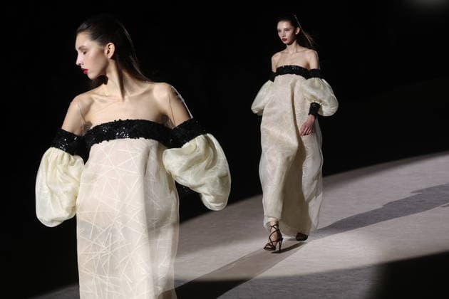Hannibal Laguna fashion show at Mercedes Benz Fashion Week Madrid A model at a Hannibal Laguna fashion show during Mercedes Benz Fashion Week, March 20, 2026, in Madrid Spain The designer Hannibal Laguna, master of womens couture and benchmark of handcrafted luxury, presents at MBFWMadrid his spring summer collection 2026 Lazuliflow, inspired by the shades of blue and the movement of the sea, in the framework of the great catwalk of IFEMA Madrid 20 MARCH 2026 FASHION Madrid Madrid Espana  Copyright: xEduardoxParrax 7383204