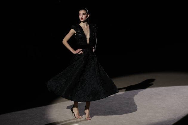 Hannibal Laguna fashion show at Mercedes Benz Fashion Week Madrid A model at a Hannibal Laguna fashion show during Mercedes Benz Fashion Week, March 20, 2026, in Madrid Spain The designer Hannibal Laguna, master of womens couture and benchmark of handcrafted luxury, presents at MBFWMadrid his spring summer collection 2026 Lazuliflow, inspired by the shades of blue and the movement of the sea, in the framework of the great catwalk of IFEMA Madrid 20 MARCH 2026 FASHION Madrid Madrid Espana  Copyright: xEduardoxParrax 7383205