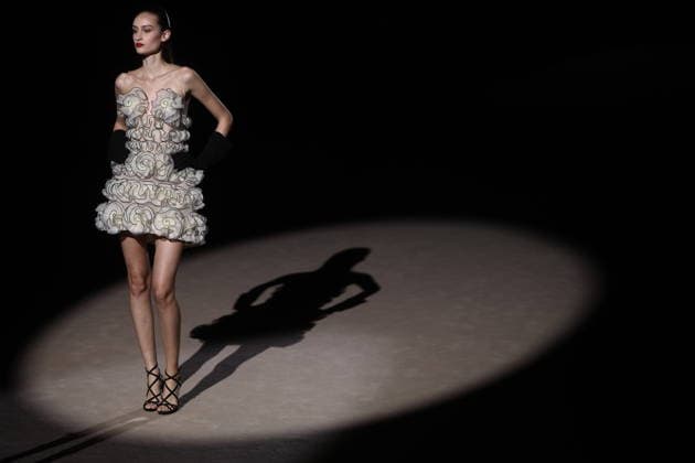 Hannibal Laguna fashion show at Mercedes Benz Fashion Week Madrid A model at a Hannibal Laguna fashion show during Mercedes Benz Fashion Week, March 20, 2026, in Madrid Spain The designer Hannibal Laguna, master of womens couture and benchmark of handcrafted luxury, presents at MBFWMadrid his spring summer collection 2026 Lazuliflow, inspired by the shades of blue and the movement of the sea, in the framework of the great catwalk of IFEMA Madrid 20 MARCH 2026 FASHION Madrid Madrid Espana  Copyright: xEduardoxParrax 7383207