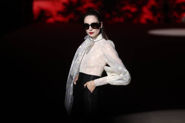 Hannibal Laguna fashion show at Mercedes Benz Fashion Week Madrid A model at a Hannibal Laguna fashion show during Mercedes Benz Fashion Week, March 20, 2026, in Madrid Spain The designer Hannibal Laguna, master of womens couture and benchmark of handcrafted luxury, presents at MBFWMadrid his spring summer collection 2026 Lazuliflow, inspired by the shades of blue and the movement of the sea, in the framework of the great catwalk of IFEMA Madrid 20 MARCH 2026 FASHION Madrid Madrid Espana  Copyright: xEduardoxParrax 7383208