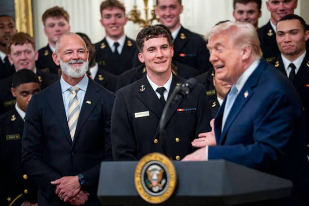 President Donald Trump greets Navy Midshipmen Quarterback Blake Horvath during the Commander in Chief s Trophy ceremony in the East Room of the White House in Washington, DC on Friday, March 20, 2026. The award is presented annually to the winner of the football competition between the Navy, Air Force and Army. Navy has won the trophy back to back years and 13 times over the last 23 years.  WAP202603201156 BONNIExCASH