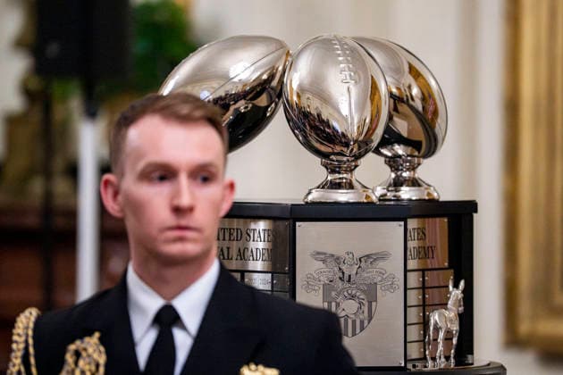 The Commander in Chiefs Trophy is seen before President Donald Trump presents it to the Navy Midshipmen Football team in the East Room of the White House in Washington, DC on Friday, March 20, 2026. The award is presented annually to the winner of the football competition between the Navy, Air Force and Army. Navy has won the trophy back to back years and 13 times over the last 23 years.  WAP202603201139 BONNIExCASH