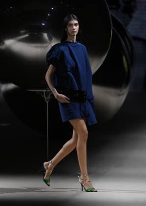 (260320) -- MADRID, March 20, 2026 -- A model presents creations of Coosy x Miguel Palacio during the Mercedes-Benz Fashion Week in Madrid, Spain, on March 20, 2026. ) SPAIN-MADRID-MERCEDES-BENZ FASHION WEEK ChengxMin 