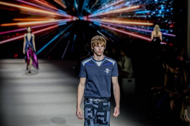 Custo Barcelona fashion show at Mercedes Benz Fashion Week Madrid A model during the Custo Barcelona fashion show at Mercedes Benz Fashion Week Madrid, March 20, 2026, in Madrid Spain The Catalan firm, led by designer Custo Dalmau, presents at the MBFWMadrid its new collection We Own the Light, a proposal of free spirit and vibrant graphics that claims the light as a symbol of energy and identity on the great catwalk of IFEMA Madrid 20 MARCH 2026 FASHION SHOW DESIGNER CUSTO MBFW Madrid Madrid Madrid Spain  Copyright: xRicardoxRubiox 7383526