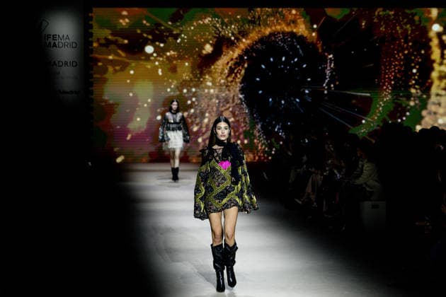 Custo Barcelona fashion show at Mercedes Benz Fashion Week Madrid A model during the Custo Barcelona fashion show at Mercedes Benz Fashion Week Madrid, March 20, 2026, in Madrid Spain The Catalan firm, led by designer Custo Dalmau, presents at the MBFWMadrid its new collection We Own the Light, a proposal of free spirit and vibrant graphics that claims the light as a symbol of energy and identity on the great catwalk of IFEMA Madrid 20 MARCH 2026 FASHION SHOW DESIGNER CUSTO MBFW Madrid Madrid Madrid Spain  Copyright: xRicardoxRubiox 7383541