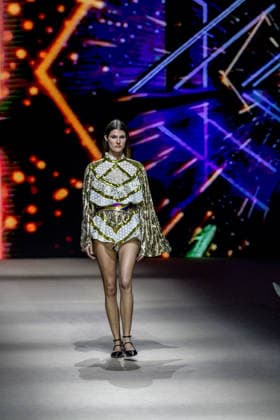 Custo Barcelona fashion show at Mercedes Benz Fashion Week Madrid A model during the Custo Barcelona fashion show at Mercedes Benz Fashion Week Madrid, March 20, 2026, in Madrid Spain The Catalan firm, led by designer Custo Dalmau, presents at the MBFWMadrid its new collection We Own the Light, a proposal of free spirit and vibrant graphics that claims the light as a symbol of energy and identity on the great catwalk of IFEMA Madrid 20 MARCH 2026 FASHION SHOW DESIGNER CUSTO MBFW Madrid Madrid Madrid Spain  Copyright: xRicardoxRubiox 7383543