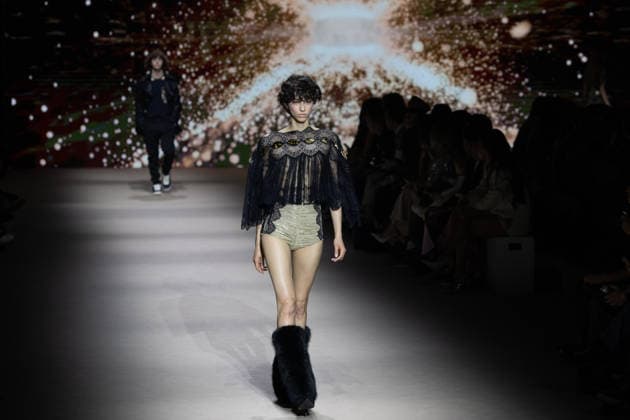 Custo Barcelona fashion show at Mercedes Benz Fashion Week Madrid A model during the Custo Barcelona fashion show at Mercedes Benz Fashion Week Madrid, March 20, 2026, in Madrid Spain The Catalan firm, led by designer Custo Dalmau, presents at the MBFWMadrid its new collection We Own the Light, a proposal of free spirit and vibrant graphics that claims the light as a symbol of energy and identity on the great catwalk of IFEMA Madrid 20 MARCH 2026 FASHION SHOW DESIGNER CUSTO MBFW Madrid Madrid Madrid Spain  Copyright: xRicardoxRubiox 7383546