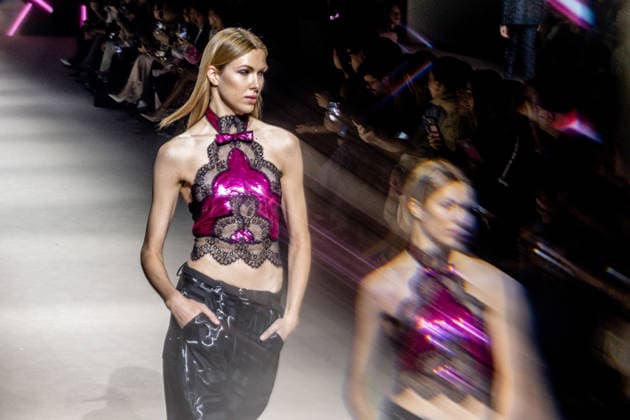 Custo Barcelona fashion show at Mercedes Benz Fashion Week Madrid A model during the Custo Barcelona fashion show at Mercedes Benz Fashion Week Madrid, March 20, 2026, in Madrid Spain The Catalan firm, led by designer Custo Dalmau, presents at the MBFWMadrid its new collection We Own the Light, a proposal of free spirit and vibrant graphics that claims the light as a symbol of energy and identity on the great catwalk of IFEMA Madrid 20 MARCH 2026 FASHION SHOW DESIGNER CUSTO MBFW Madrid Madrid Madrid Spain  Copyright: xRicardoxRubiox 7383547