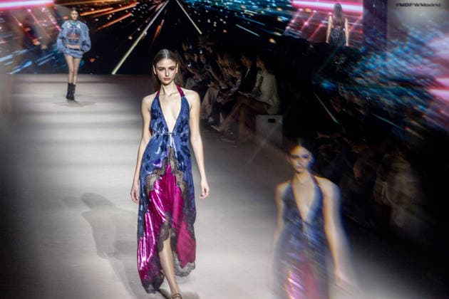 Custo Barcelona fashion show at Mercedes Benz Fashion Week Madrid A model during the Custo Barcelona fashion show at Mercedes Benz Fashion Week Madrid, March 20, 2026, in Madrid Spain The Catalan firm, led by designer Custo Dalmau, presents at the MBFWMadrid its new collection We Own the Light, a proposal of free spirit and vibrant graphics that claims the light as a symbol of energy and identity on the great catwalk of IFEMA Madrid 20 MARCH 2026 FASHION SHOW DESIGNER CUSTO MBFW Madrid Madrid Madrid Spain  Copyright: xRicardoxRubiox 7383548