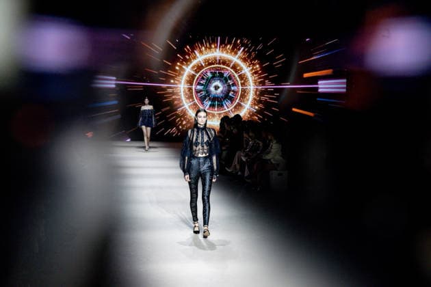Custo Barcelona fashion show at Mercedes Benz Fashion Week Madrid A model during the Custo Barcelona fashion show at Mercedes Benz Fashion Week Madrid, March 20, 2026, in Madrid Spain The Catalan firm, led by designer Custo Dalmau, presents at the MBFWMadrid its new collection We Own the Light, a proposal of free spirit and vibrant graphics that claims the light as a symbol of energy and identity on the great catwalk of IFEMA Madrid 20 MARCH 2026 FASHION SHOW DESIGNER CUSTO MBFW Madrid Madrid Madrid Spain  Copyright: xRicardoxRubiox 7383550