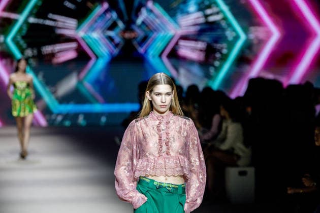 Custo Barcelona fashion show at Mercedes Benz Fashion Week Madrid A model during the Custo Barcelona fashion show at Mercedes Benz Fashion Week Madrid, March 20, 2026, in Madrid Spain The Catalan firm, led by designer Custo Dalmau, presents at the MBFWMadrid its new collection We Own the Light, a proposal of free spirit and vibrant graphics that claims the light as a symbol of energy and identity on the great catwalk of IFEMA Madrid 20 MARCH 2026 FASHION SHOW DESIGNER CUSTO MBFW Madrid Madrid Madrid Spain  Copyright: xRicardoxRubiox 7383537
