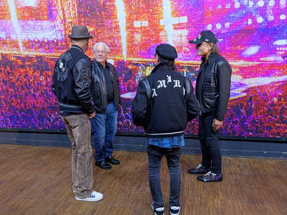 Marc Theis in front of his work Photographer Marc Theis shows his work to the Scorpions Copyright: xBerndxGüntherx