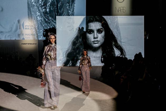 Malne fashion show at Mercedes Benz Fashion Week Madrid A model during a Malne fashion show at Mercedes Benz Fashion Week Madrid, on March 20, 2026, in Madrid Spain The Madrid-based firm, directed by designers Paloma Álvarez and Juanjo Mánez, presents at the 83rd edition of MBFWMadrid its sustainable and slow fashion haute couture proposal, in the year of the 40th anniversary of the catwalk, which brings together at IFEMA its main Spanish fashion creators, presents at the 83rd edition of MBFWMadrid its proposal of sustainable haute couture and slow fashion, in the year of the 40th anniversary of the catwalk, which brings together at IFEMA the main creators of contemporary Spanish fashion today 20 MARCH 2026 FASHION DESIGNER COLLECTION SHOW Copyright: xRicardoxRubiox 7383598