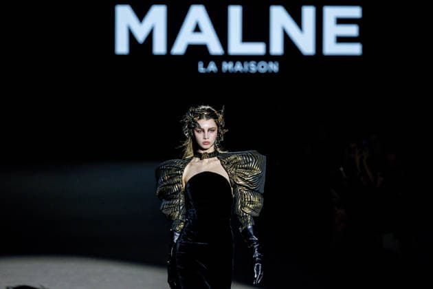 Malne fashion show at Mercedes Benz Fashion Week Madrid A model during a Malne fashion show at Mercedes Benz Fashion Week Madrid, on March 20, 2026, in Madrid Spain The Madrid-based firm, directed by designers Paloma Álvarez and Juanjo Mánez, presents at the 83rd edition of MBFWMadrid its sustainable and slow fashion haute couture proposal, in the year of the 40th anniversary of the catwalk, which brings together at IFEMA its main Spanish fashion creators, presents at the 83rd edition of MBFWMadrid its proposal of sustainable haute couture and slow fashion, in the year of the 40th anniversary of the catwalk, which brings together at IFEMA the main creators of contemporary Spanish fashion today 20 MARCH 2026 FASHION DESIGNER COLLECTION SHOW Copyright: xRicardoxRubiox 7383603