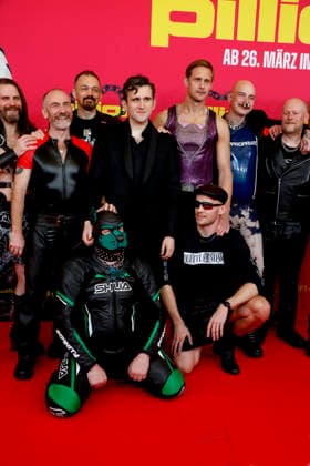 Harry Melling behind the dog Alexander Skarsgard on the right and director Harry Lighton next to the dog at the German premiere of PILLION at Kino International in Berlin on 20 3 2026
