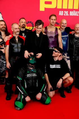 Harry Melling behind the dog Alexander Skarsgard on the right and director Harry Lighton next to the dog at the German premiere of PILLION at Kino International in Berlin on 20 3 2026