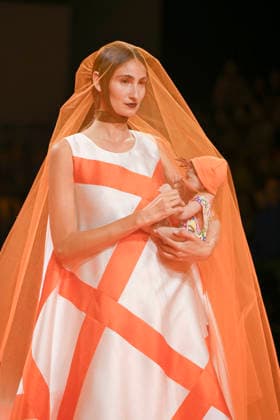 Agatha Ruiz de la Prada - Mercedes-Benz Fashion Week Madrid - 20 Mar 2026 A model walks the runway wearing a design by Agatha Ruiz de la Prada during the Mercedes-Benz Fashion Week de Madrid in IFEMA. Madrid Spain Copyright: xAtilanoxGarciax xSOPAxImagesx photos09610