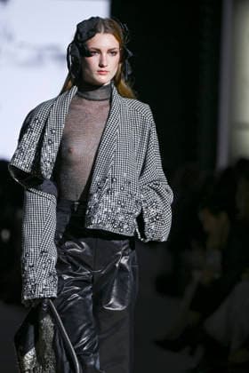 Malne - Mercedes-Benz Fashion Week Madrid - 20 Mar 2026 A model walks the runway wearing a design by Malne during the Mercedes-Benz Fashion Week de Madrid in IFEMA. Madrid Spain Copyright: xAtilanoxGarciax xSOPAxImagesx photos09806