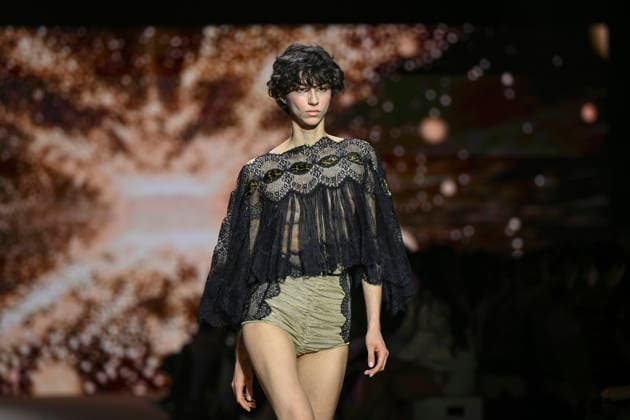 Custo - Mercedes-Benz Fashion Week Madrid - 20 Mar 2026 A model walks the runway wearing a design by Custo during the Mercedes-Benz Fashion Week de Madrid in IFEMA. Madrid Spain Copyright: xAtilanoxGarciax xSOPAxImagesx photos09781