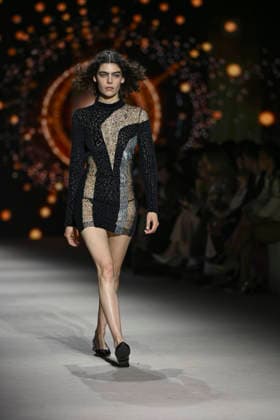 Custo - Mercedes-Benz Fashion Week Madrid - 20 Mar 2026 A model walks the runway wearing a design by Custo during the Mercedes-Benz Fashion Week de Madrid in IFEMA. Madrid Spain Copyright: xAtilanoxGarciax xSOPAxImagesx photos09784
