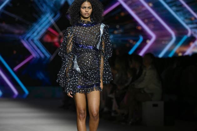 Custo - Mercedes-Benz Fashion Week Madrid - 20 Mar 2026 A model walks the runway wearing a design by Custo during the Mercedes-Benz Fashion Week de Madrid in IFEMA. Madrid Spain Copyright: xAtilanoxGarciax xSOPAxImagesx photos09792