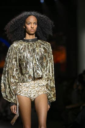 Custo - Mercedes-Benz Fashion Week Madrid - 20 Mar 2026 A model walks the runway wearing a design by Custo during the Mercedes-Benz Fashion Week de Madrid in IFEMA. Madrid Spain Copyright: xAtilanoxGarciax xSOPAxImagesx photos09780
